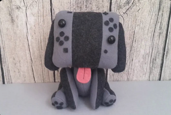 Nintendo Switch Joycon grip dog plush by @TheAnnaTheRed